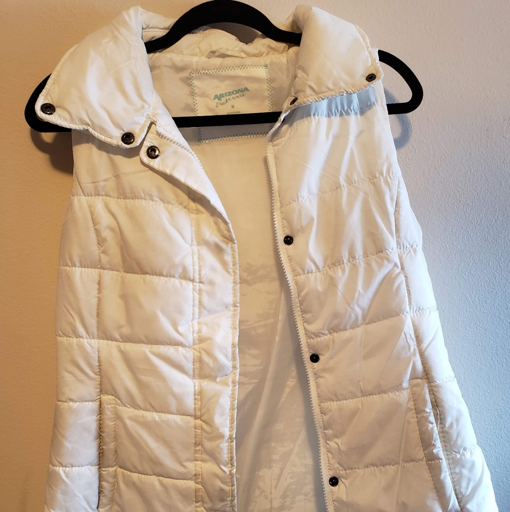 White arizona and jean vest